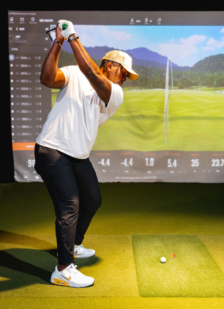 Person golfing at a Five Iron Golf location