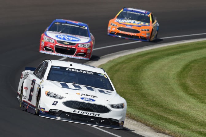 Brad Keselowski (foreground) leads A.J. Allmendinger and Ricky Stenhouse Jr. Photo from cnd.inquistir.com