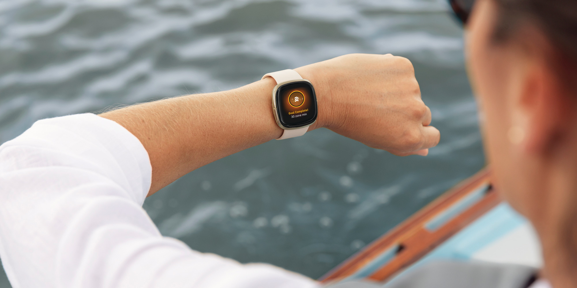 person_looking_at_smart_watch