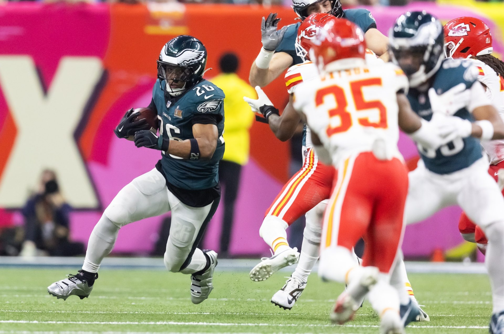 Feb 9, 2025; New Orleans, LA, USA; Philadelphia Eagles running back Saquon Barkley (26) against the Kansas City Chiefs during Super Bowl LIX at Ceasars Superdome.