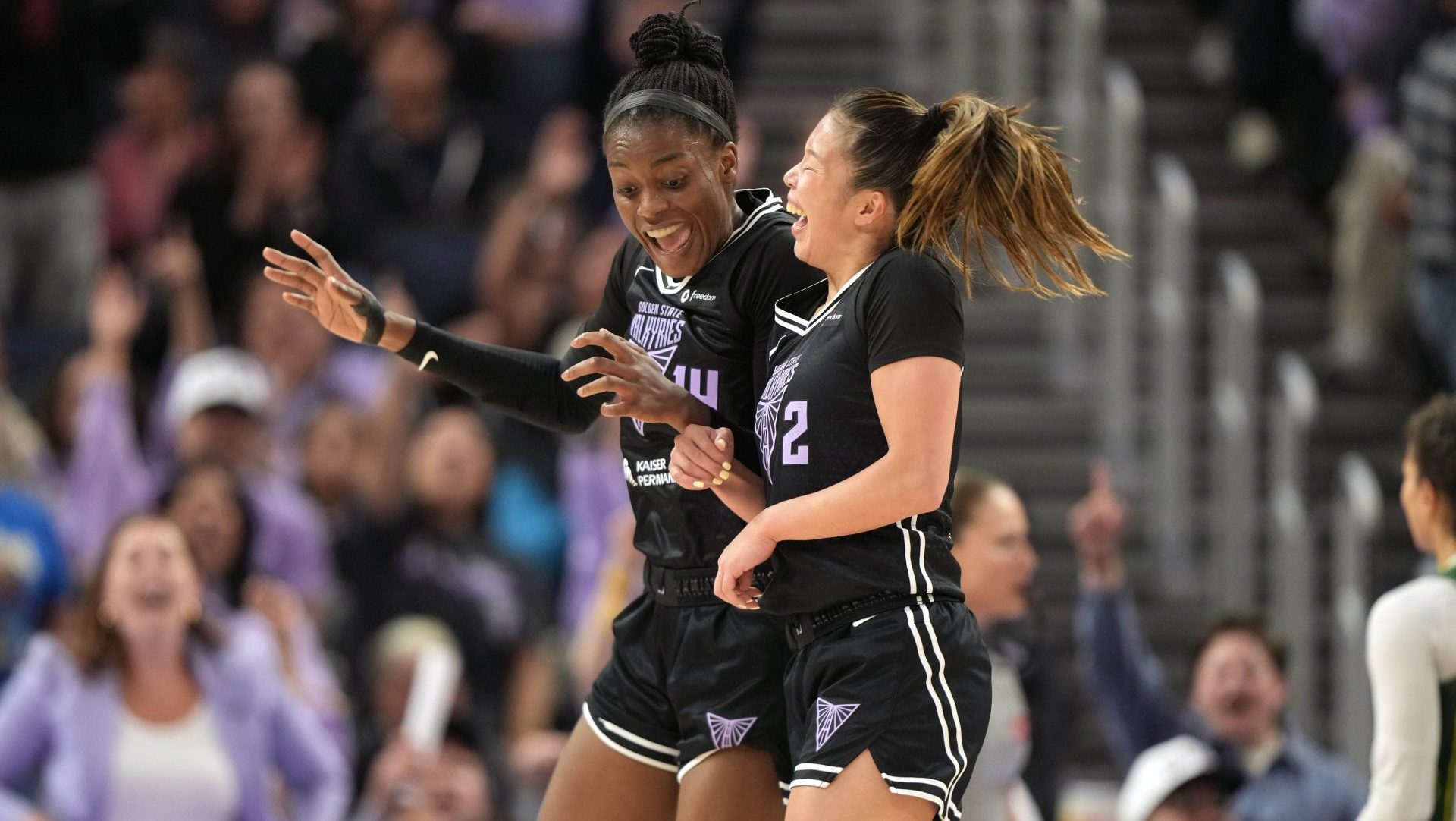 Jun 29, 2025; San Francisco, California, USA; Golden State Valkyries center Temi Fagbenle (left) celebrates with guard Kaitlyn Chen (2) after scoring against the Seattle Storm during the third quarter at Chase Center
