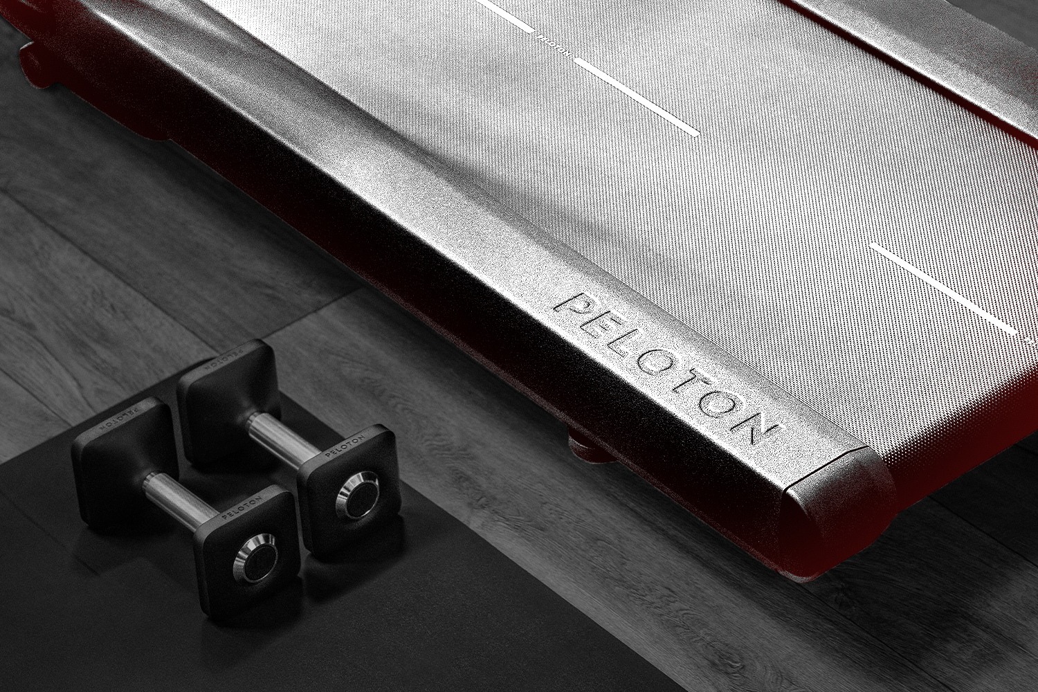 peloton_logo_on_treadmill_and_weights