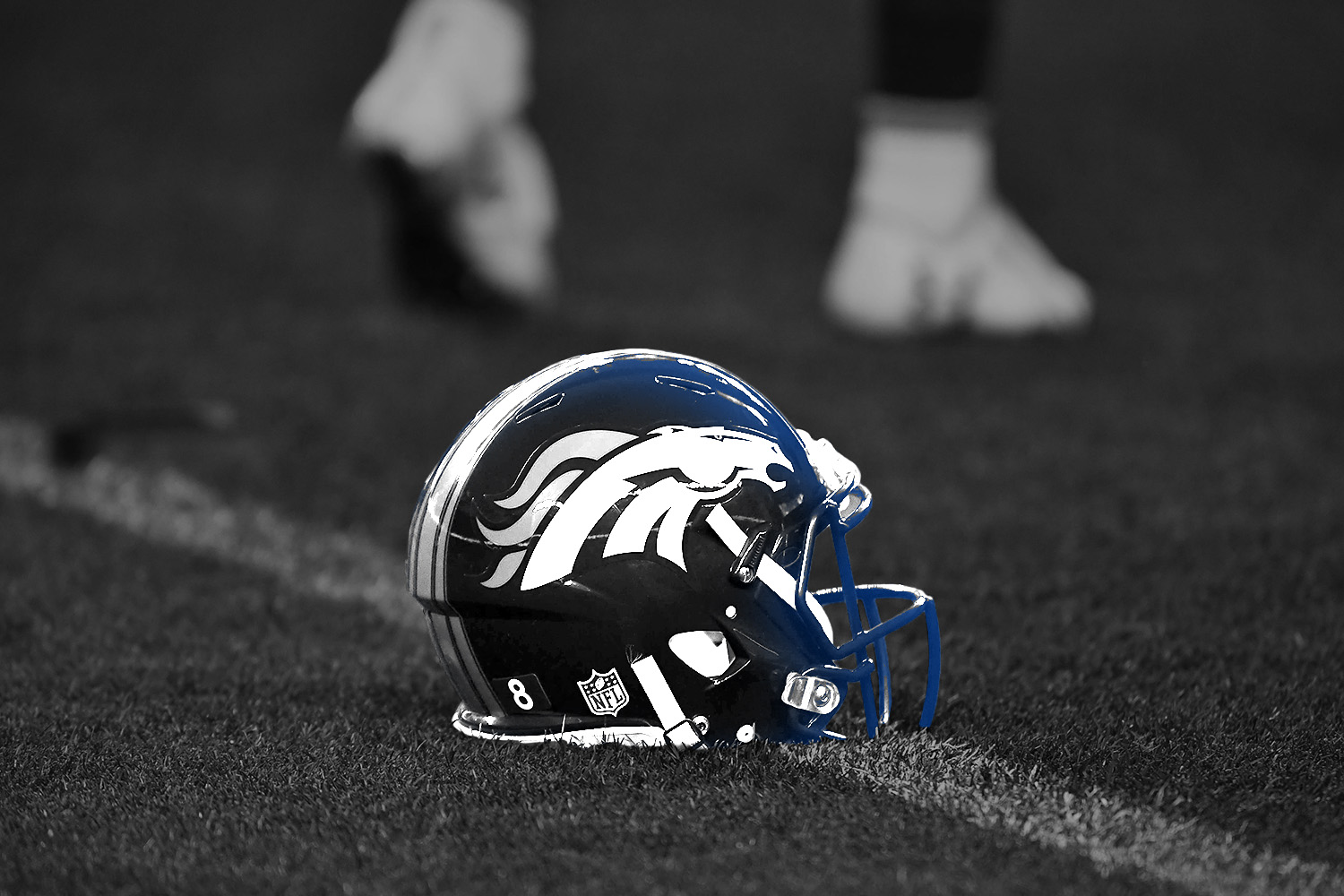 broncos_helmet_on_field