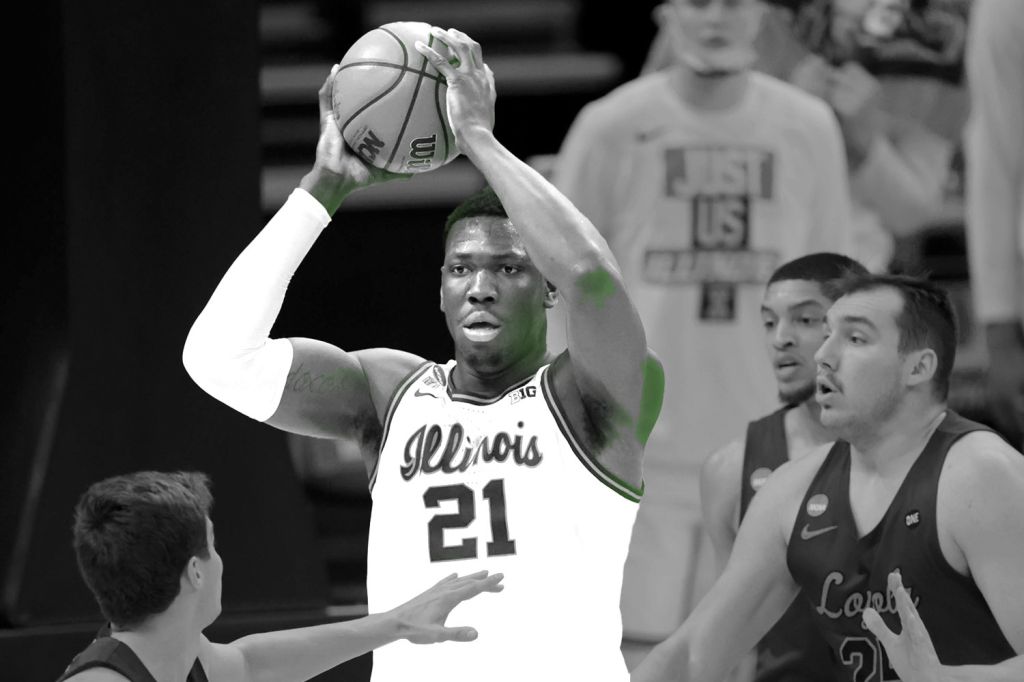 man_holding_basketball