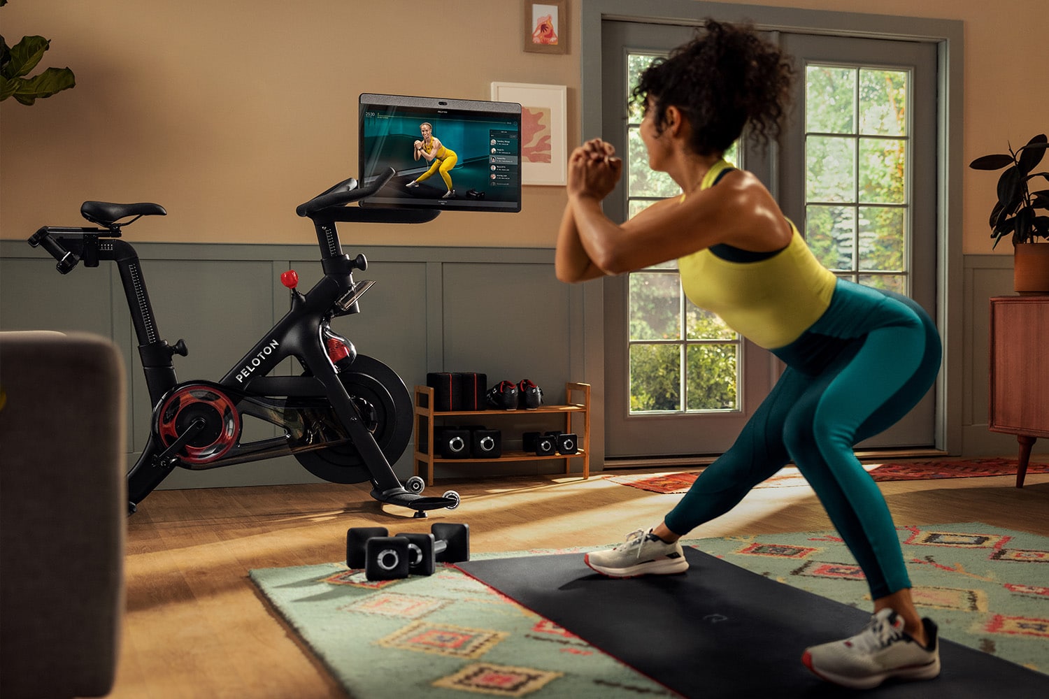 A Peloton user enjoys a Peloton fitness workout.