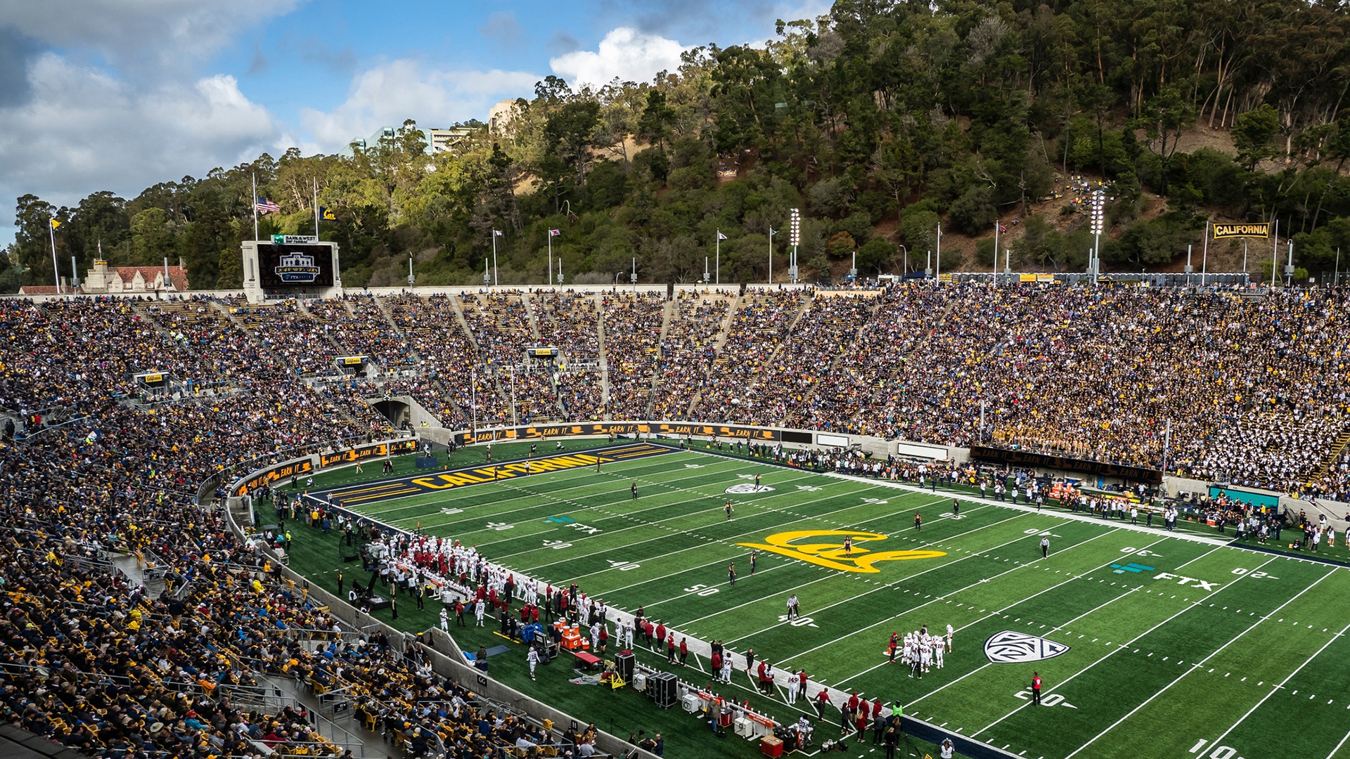 Fans watch college football game inside of Berkley's California Memorial Stadium