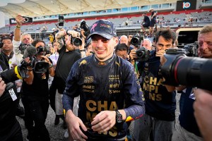 Max Verstappen surrounded by photographers after winning Formula 1 race