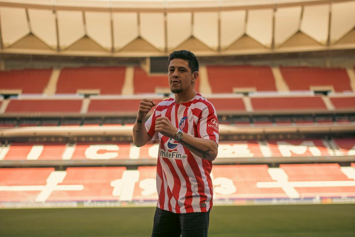 UFC fighter Brandon Moreno poses for picture inside Atletico Madrid stadium