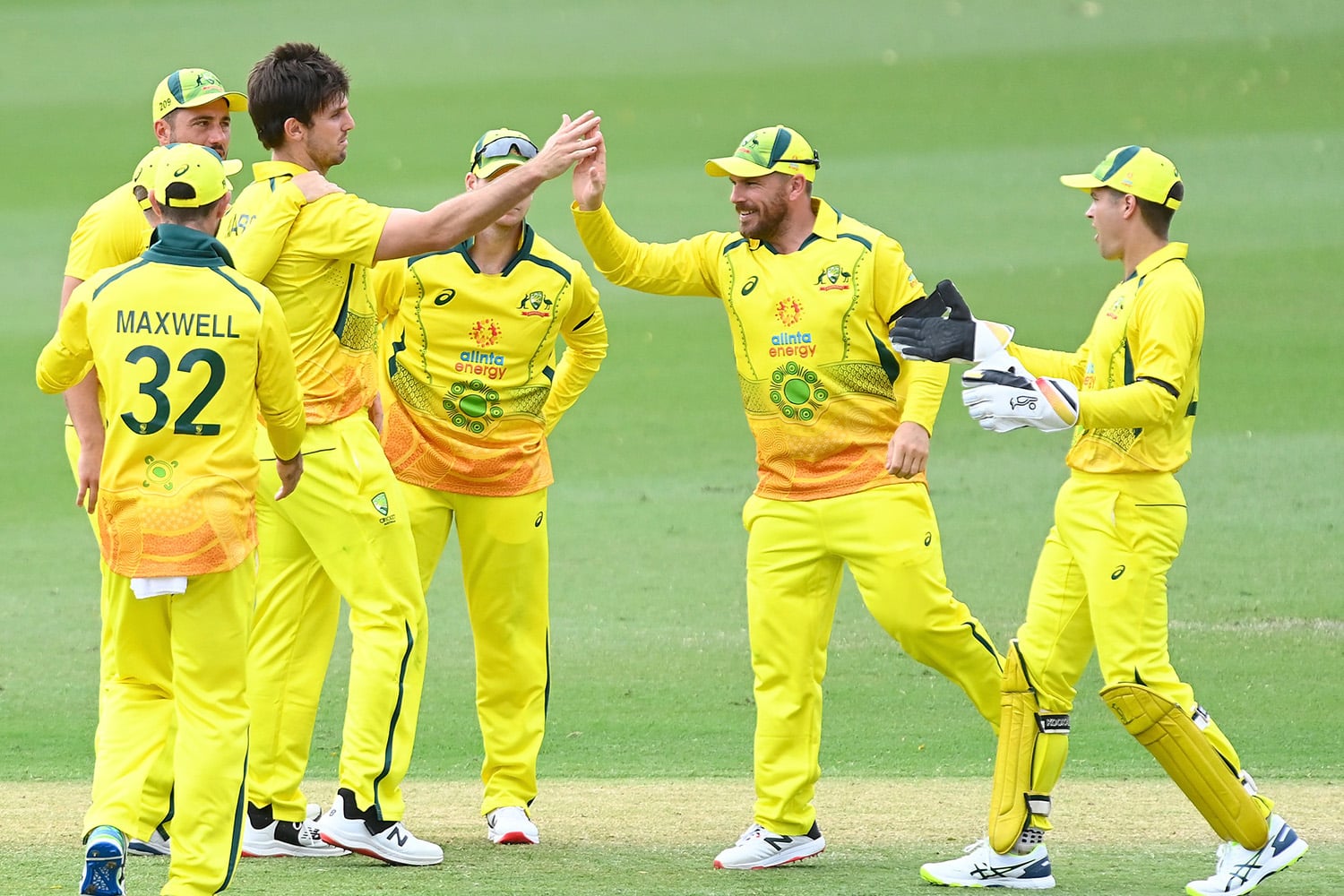 Members of Australia's cricket team warming up before game