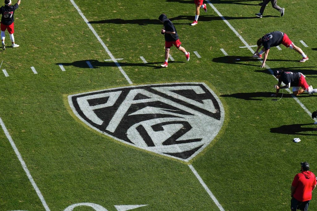 PAC 12 logo on football field