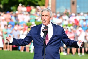 PGA Tour Commissioner Jay Monahan speaks in front of crowd