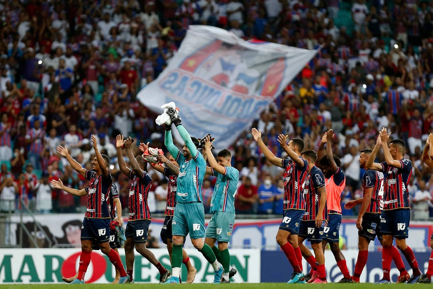 Players from Brazilian team Esporte Club Bahia salute fans after game