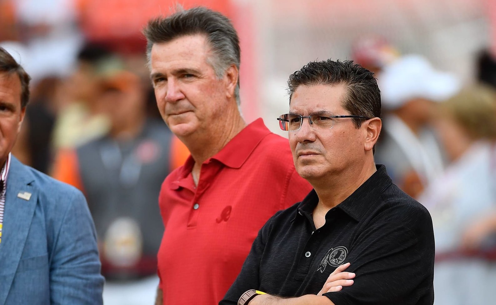 Washington Commanders owner Dan Snyder stands next to former team President Bruce Allen