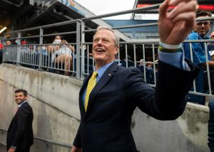 Former Gov. of Massachusetts and new NCAA President Charlie Baker walking into tunnel during sporting event