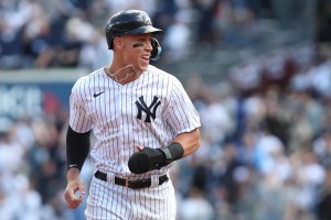 Aaron Judge celebrates while rounding bases