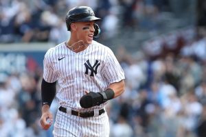 Aaron Judge celebrates while rounding bases