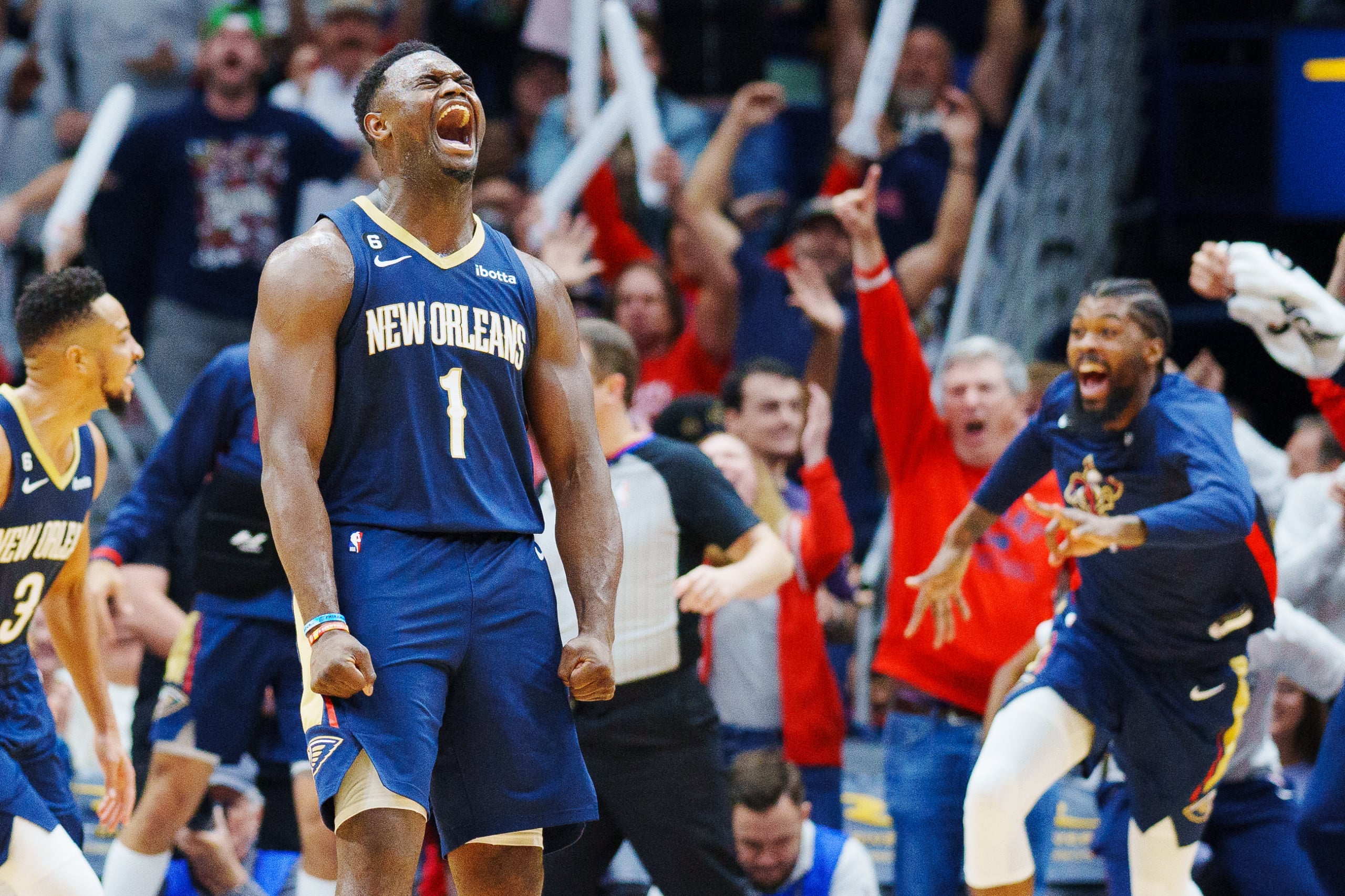 Zion Williamson and Pelicans teammates celebrate on court after a big play