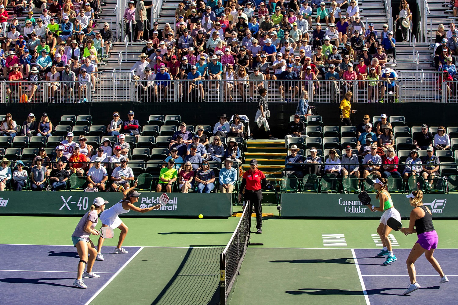 Players face off in a pickleball match.