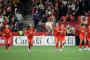 The Women's Canadian National Team shown together on field during a home match.