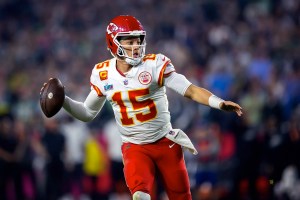 Kansas City Chiefs quarterback, Patrick Mahomes, preparing the throw the ball during play.