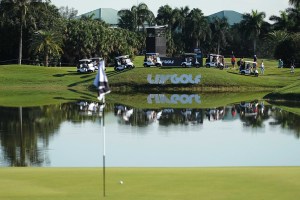 A view of carts traveling on the course during an LIV Golf series event.