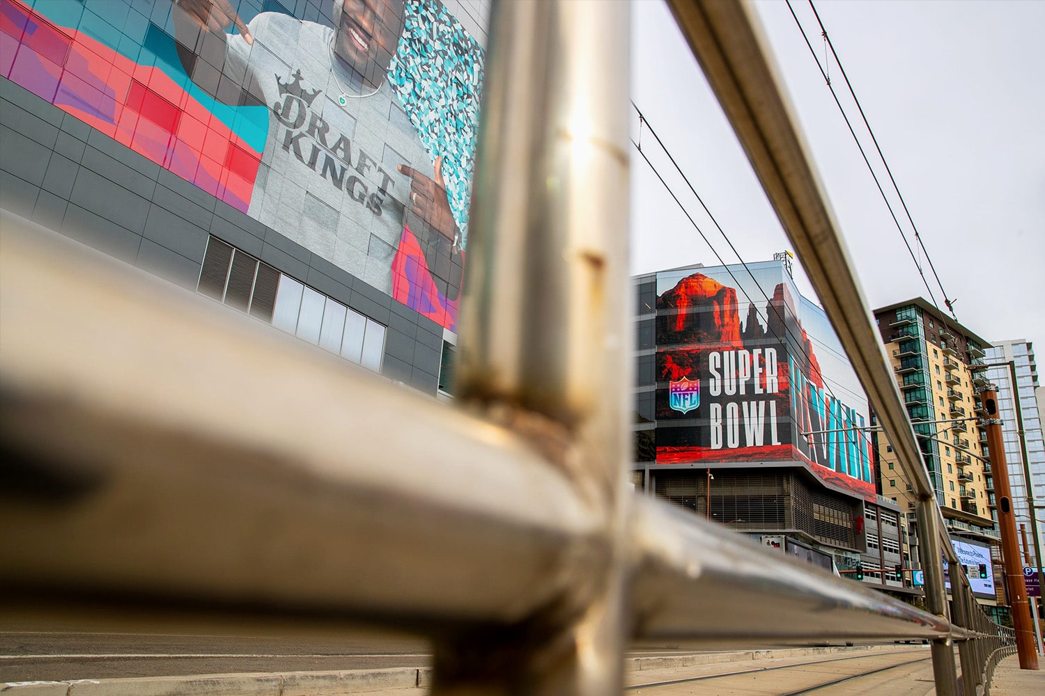 View of Super Bowl LVII signage and a Draft Kings billboard