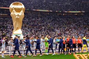 Players from Argentina and France before the World Cup Final match in December.