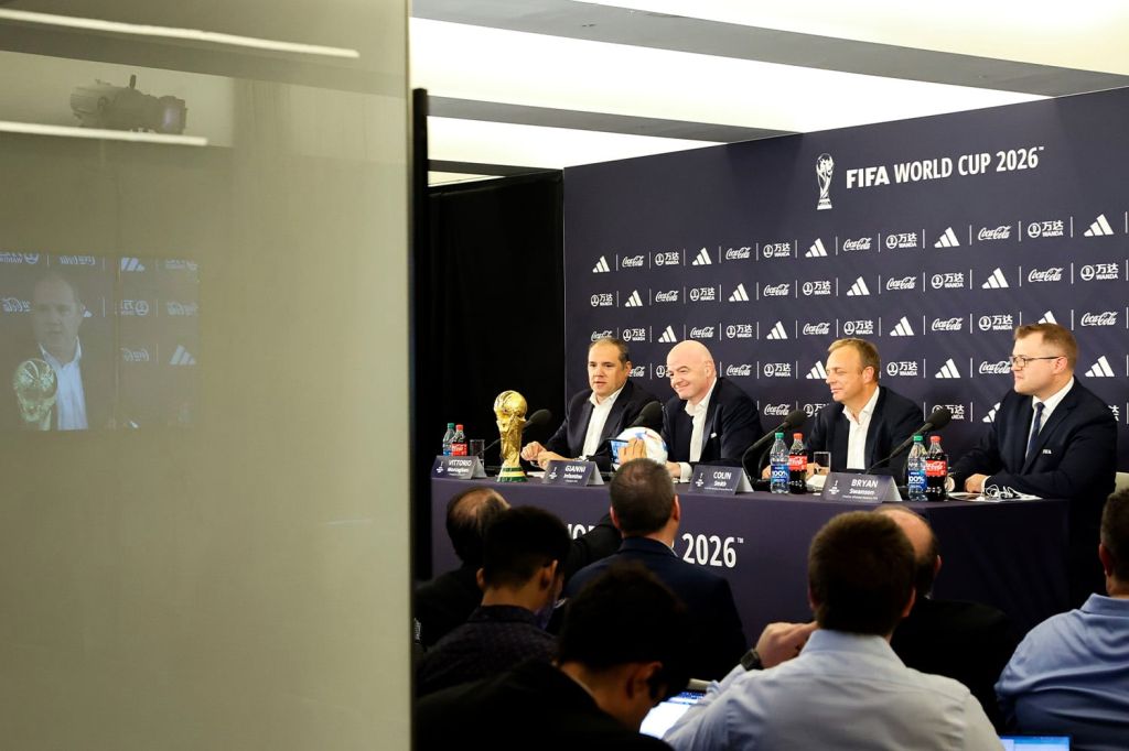 Victor Montagliani, Gianni Infantino, Colin Smith, and Bryan Swanson speak during a FIFA World Cup 2026 Announcement press conference
