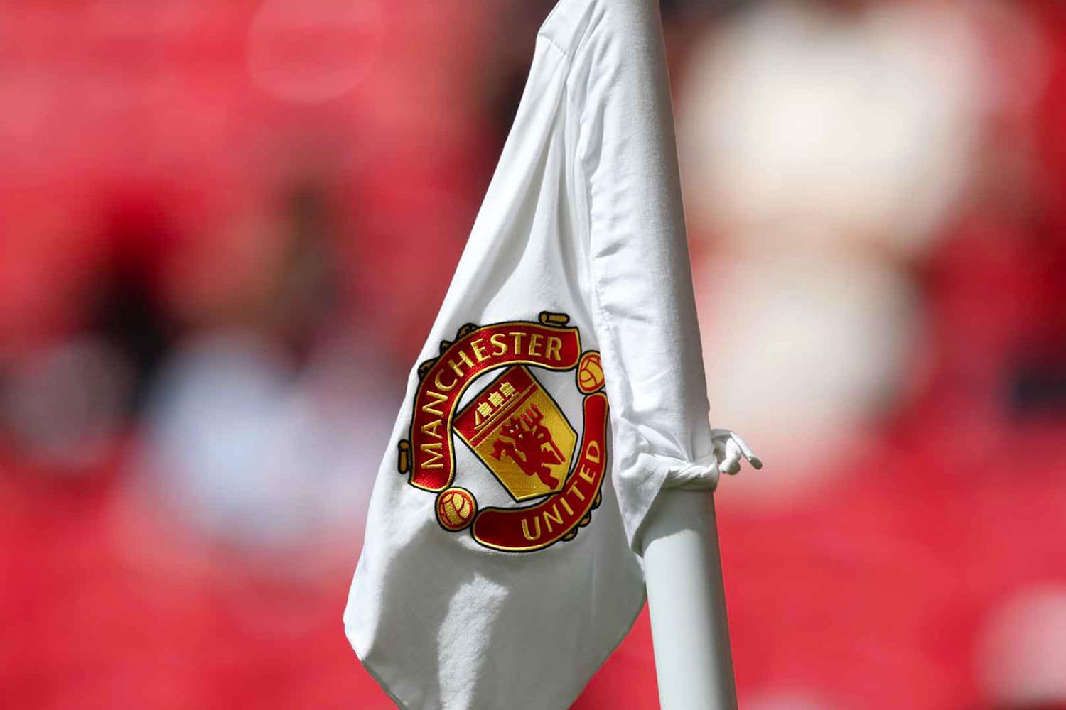 A view of a Manchester United badge on the corner flag.