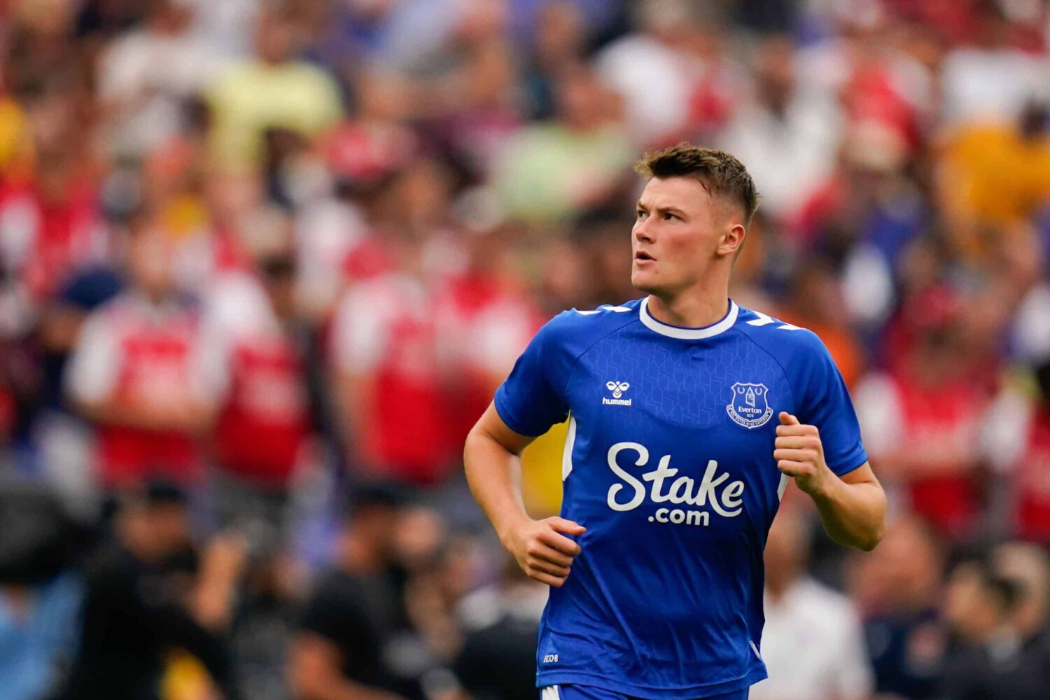 An Everton player displays shirt sponsor Stake.com, a gambling company, during a match.