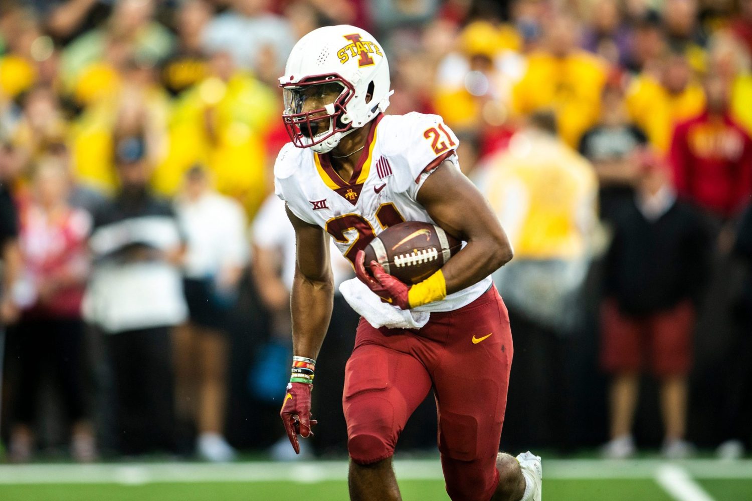 Iowa State running back Jirehl Brock rushes during a NCAA football game against Iowa.