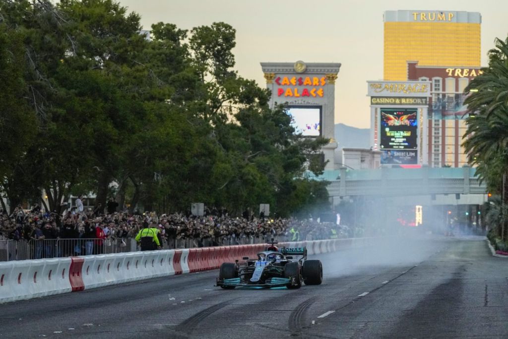 Mercedes-AMG Petronas driver George Russell drives on the track during the Formula One Las Vegas Grand Prix Launch Party at Las Vegas Strip.