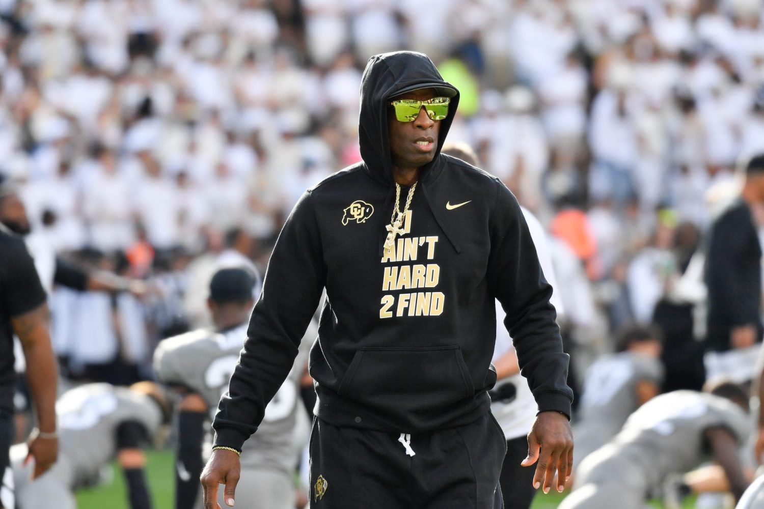 Colorado Buffaloes head coach Deion Sanders walks the field during game agains the USC Trojans at Folsom Field.