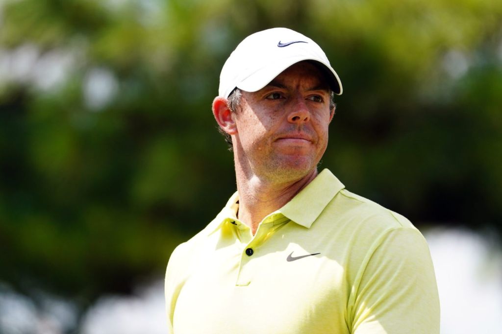 Rory McIlroy reacts to his putt on the third green during the third round of the TOUR Championship golf tournament at East Lake Golf Club.