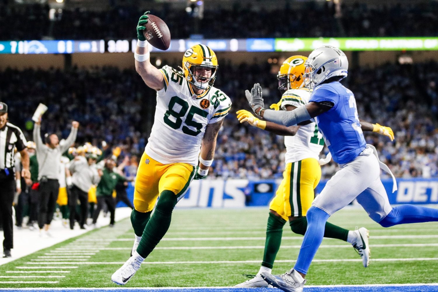 Green Bay Packers tight end Tucker Kraft celebrates a touchdown against the Detroit Lions during the first half at Ford Field in Detroit on Thursday, Nov. 23, 2023.