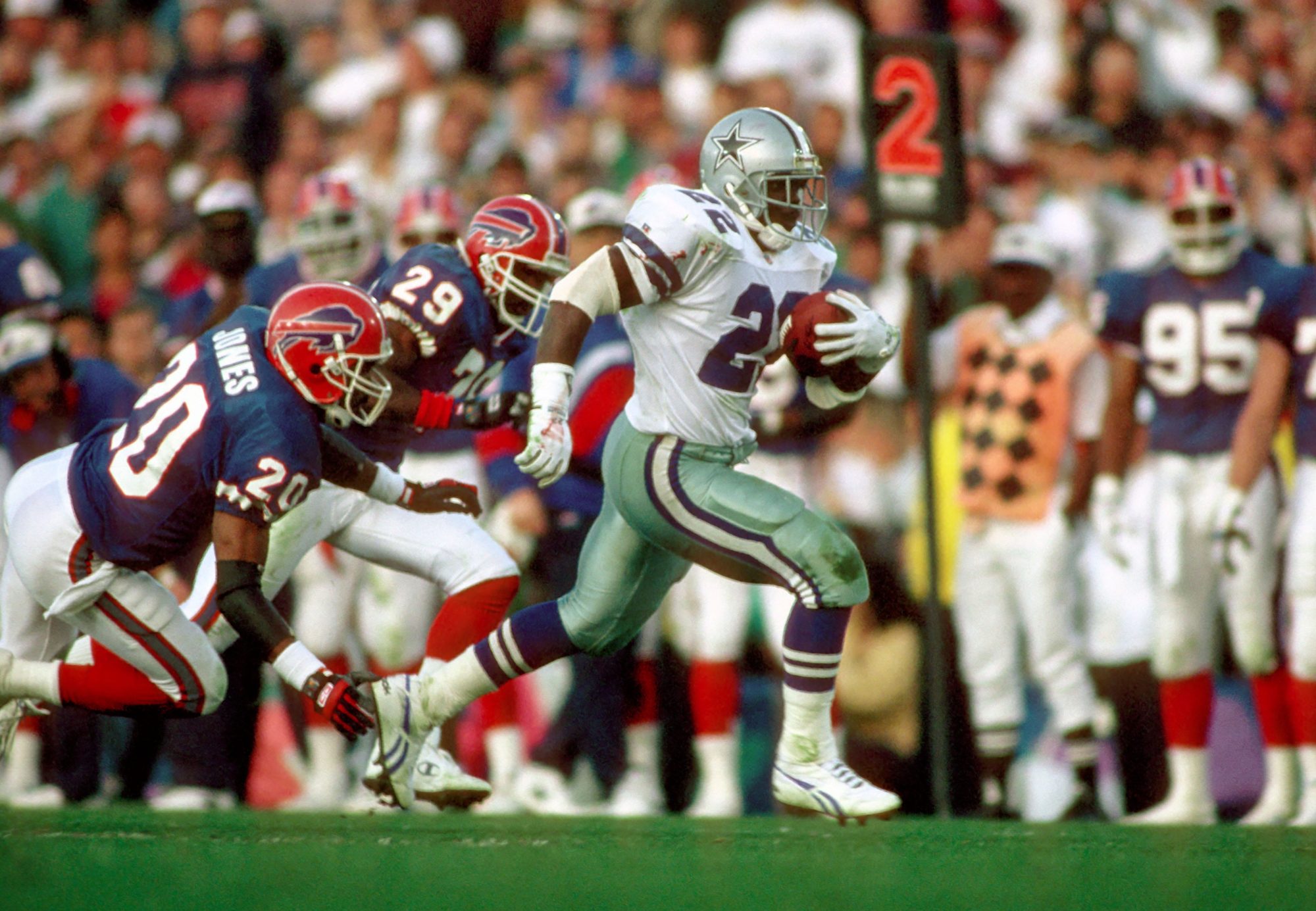 Jan 31, 1993; Pasadena, CA, USA; FILE PHOTO; Dallas Cowboys running back (22) EMMITT SMITH in action against the Buffalo Bills during Super Bowl XXVII at the Rose Bowl. Smith ran for 108 yards and 1 touchdown. The Cowboys defeated the Bills 52-17.