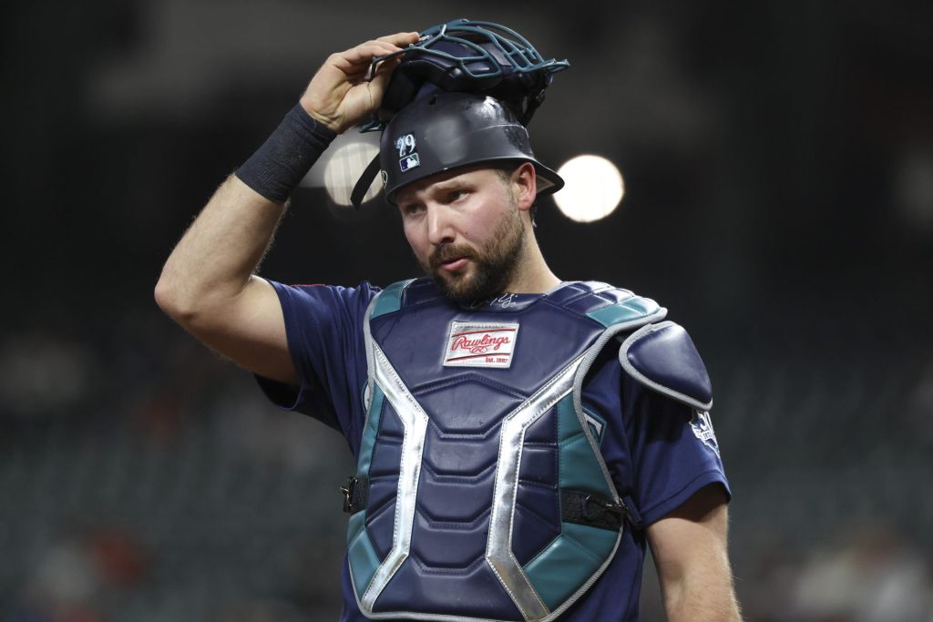 May 11, 2026; Houston, Texas, USA; Seattle Mariners catcher Cal Raleigh (29) puts on his mask after a play during the second inning against the Houston Astros at Daikin Park.