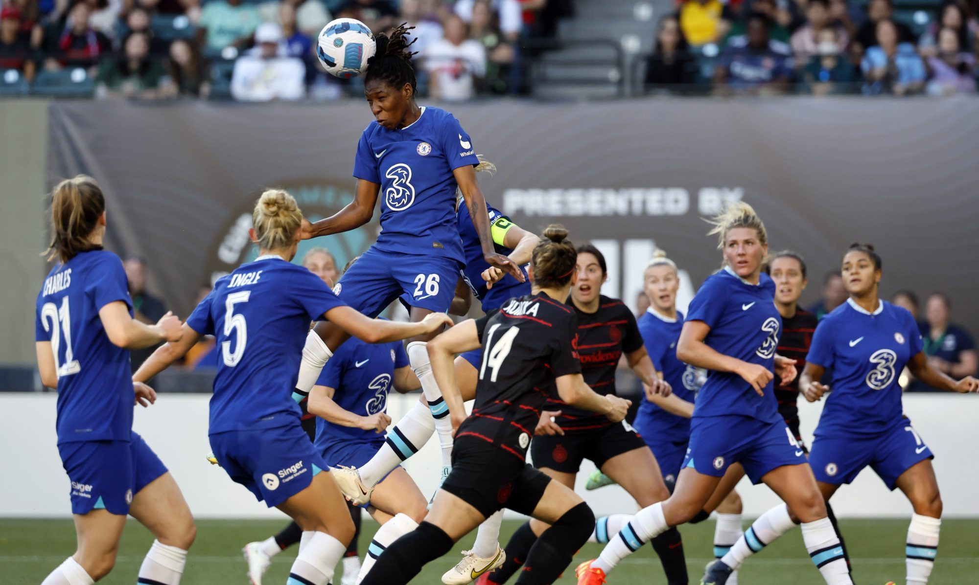 Aug 20, 2022; Portland, Oregon, USA; Chelsea defender Kadeisha Buchanan (26) clears a ball with a header during the second half against the Portland Thorns at Providence Park.