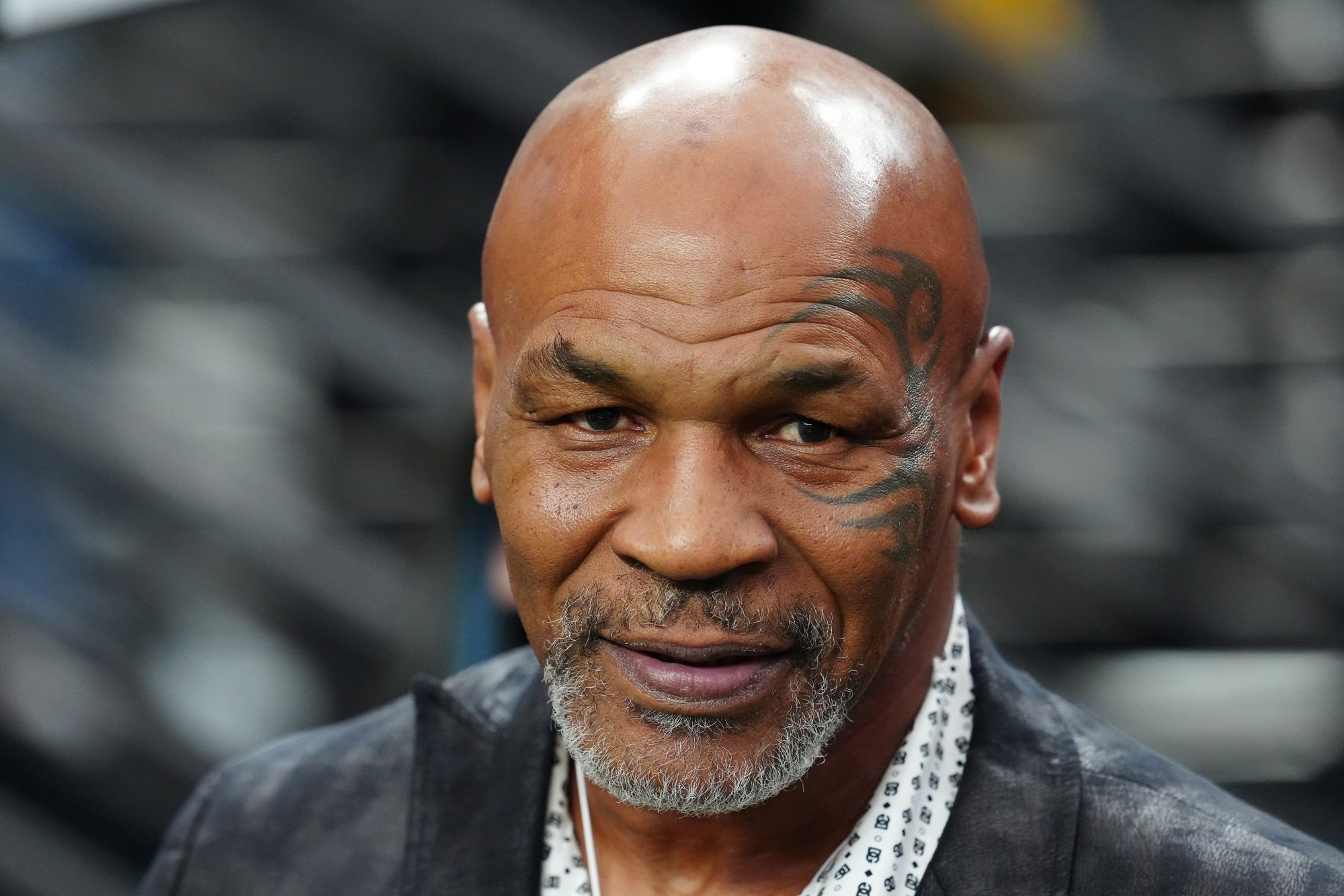 Sep 24, 2023; Paradise, Nevada, USA; Mike Tyson poses for a photo on the sidelines before the start of a game between the Las Vegas Raiders and the Pittsburgh Steelers at Allegiant Stadium.