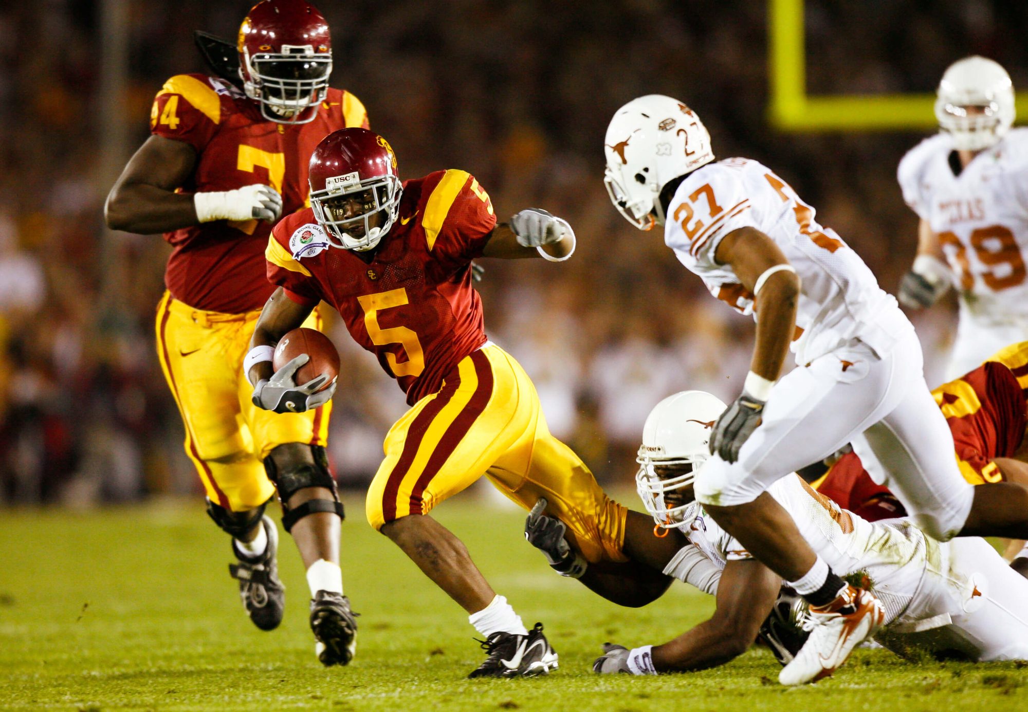 Jan 4, 2006; Pasadena, CA, USA: FILE PHOTO; Southern California Trojans running back Reggie Bush (5) in action against the Texas Longhorns during the 2006 Rose Bowl at the Rose Bowl. The Longhorns defeated the Trojans 41-38. Mandatory Credit: Richard Mackson-USA TODAY Network