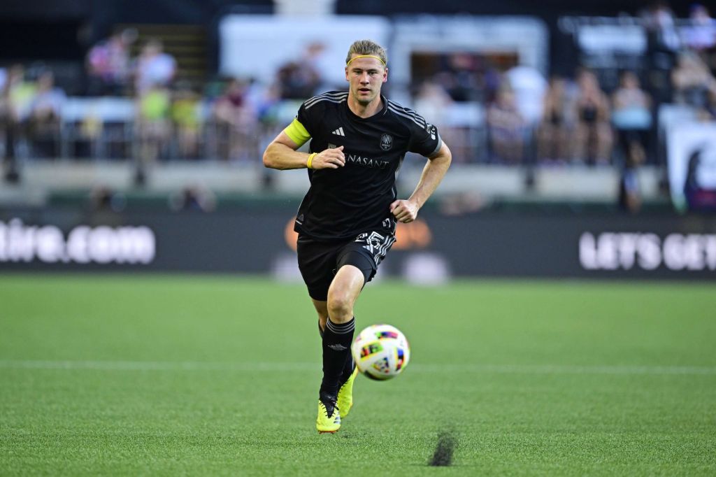 Jul 7, 2024; Portland, Oregon, USA; Nashville SC defender Walker Zimmerman (25) controls the ball during the first half against the Portland Timbers at Providence Park. Mandatory Credit: Troy Wayrynen-USA TODAY Sports