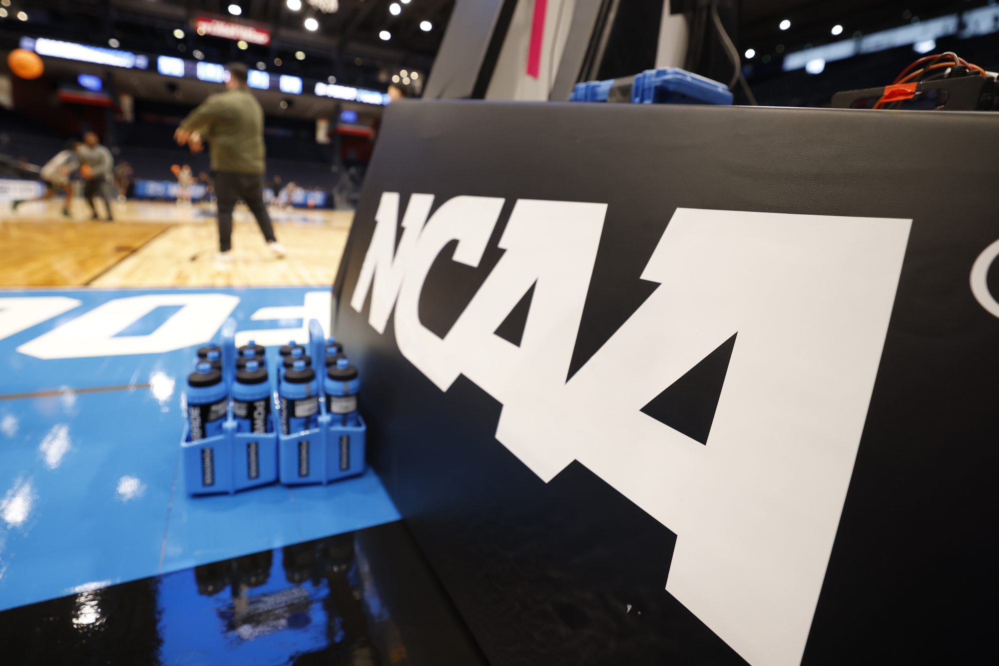 Mar 18, 2024; Dayton, OH, USA; General view of the NCAA logo during NCAA Tournament First Four Practice at UD Arena.