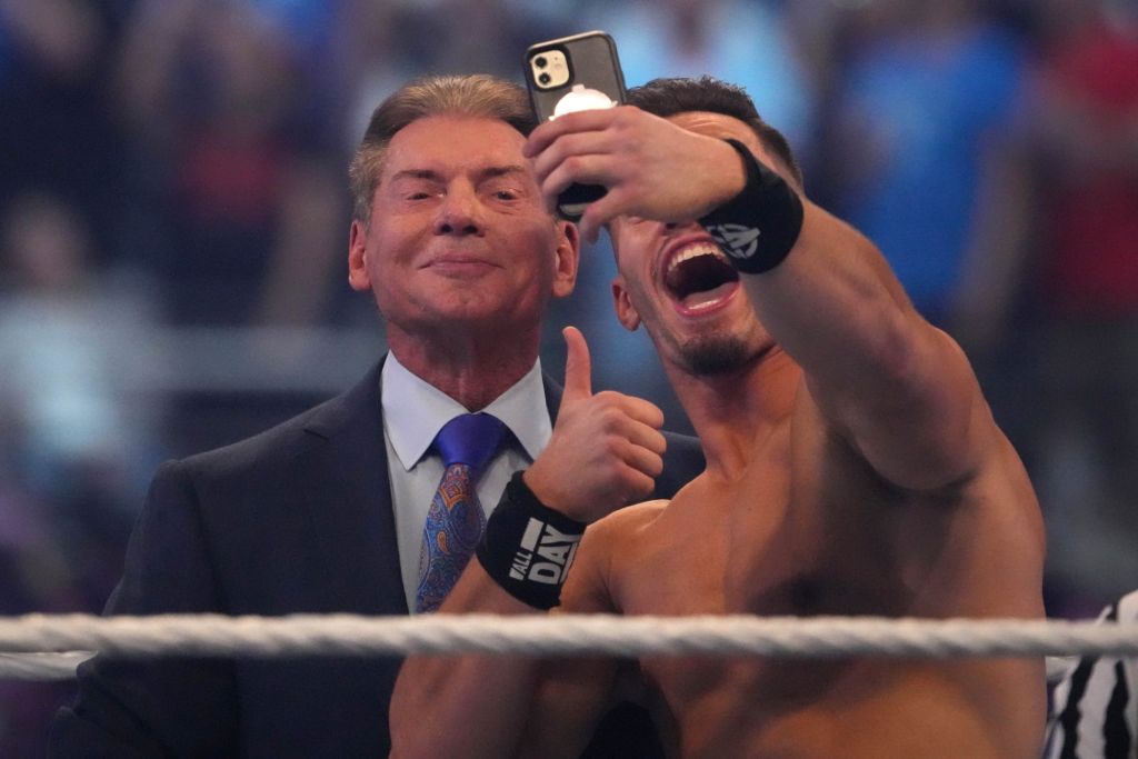 Austin Theory takes a selfie with WWE owner Vince McMahon during WrestleMania at AT&T Stadium.