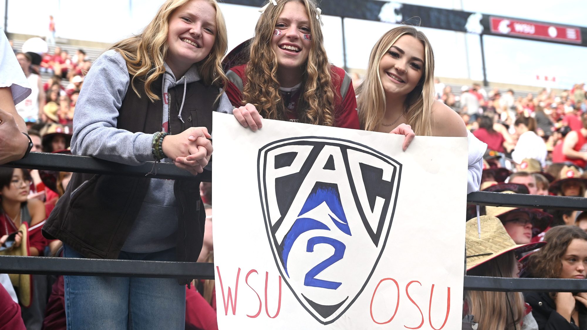 Sep 23, 2023; Pullman, Washington, USA; Washington State Cougars students hold up a Pac 2 sign during a football game against the Oregon State Beavers in the first half at Gesa Field at Martin Stadium.