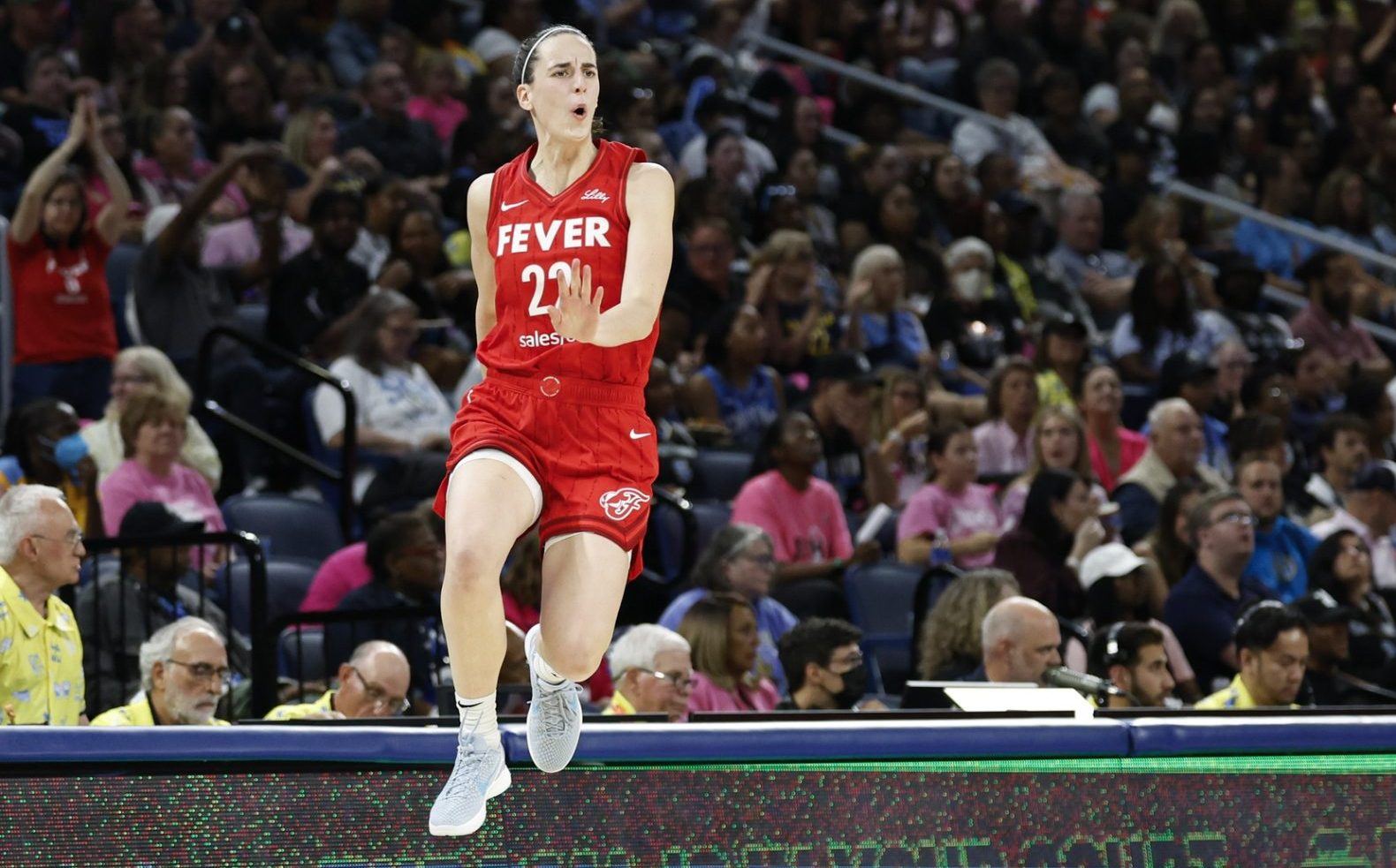 Aug 30, 2024; Chicago, Illinois, USA; Indiana Fever guard Caitlin Clark (22) celebrates after scoring against the Chicago Sky during the second half at Wintrust Arena. Mandatory Credit: Kamil Krzaczynski-USA TODAY