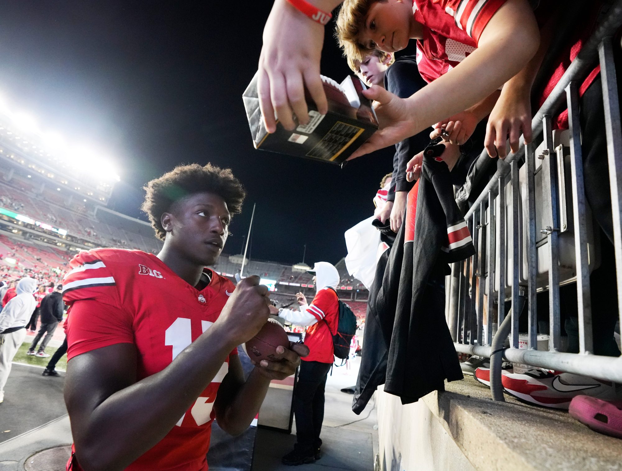 Sept. 7, 2024; Columbus, Ohio, USA; Ohio State Buckeyes tight end Jelani Thurman (15) signs autographs for fans following an NCAA Division I football game against the Western Michigan Broncos on Saturday at Ohio Stadium.