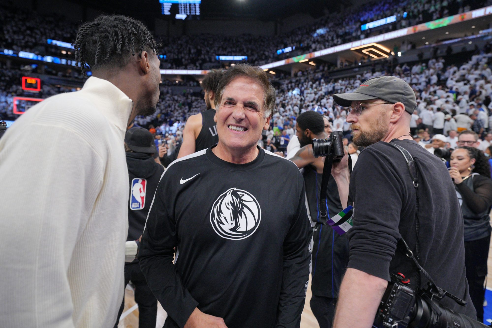 May 24, 2024; Minneapolis, Minnesota, USA; Dallas Mavericks owner Mark Cuban celebrates after defeating the Minnesota Timberwolves in game two of the western conference finals for the 2024 NBA playoffs at Target Center.