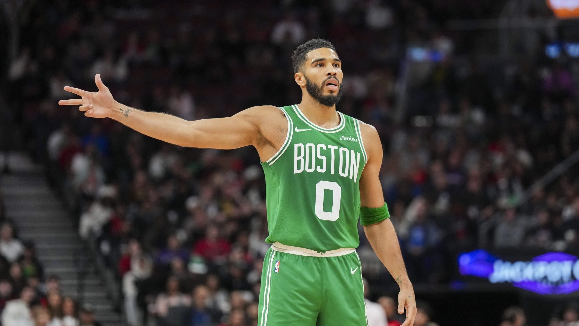 Oct 15, 2024; Toronto, Ontario, CAN; Boston Celtics forward Jayson Tatum (0) gestures against the Toronto Raptors during the first half at Scotiabank Arena.