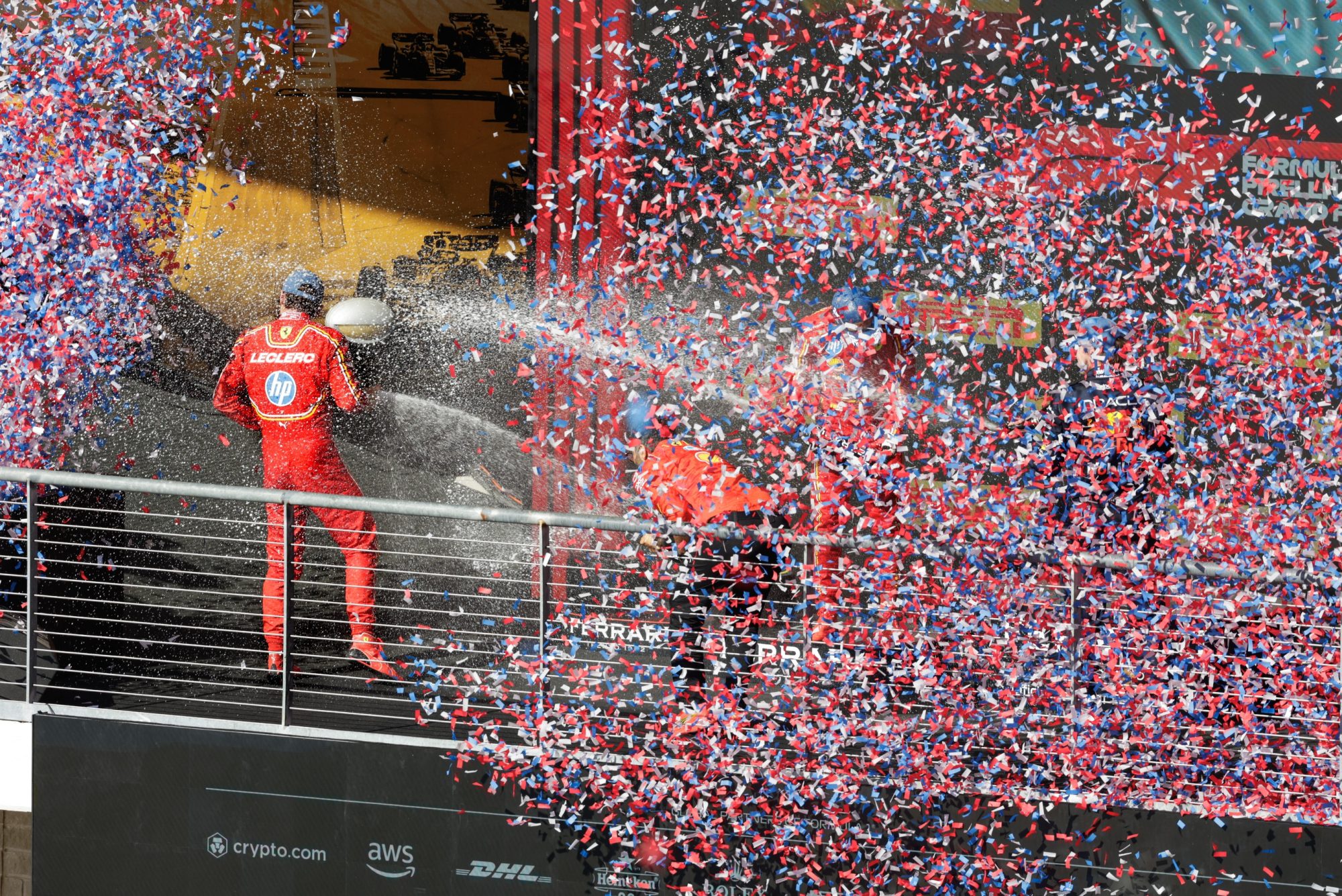 Oct 20, 2024; Austin, Texas, USA ; Charles Leclerc of Ferrari surrounded by confetti and champagne after winning the Formula One US Grand Prix at Circuit of the Americas.