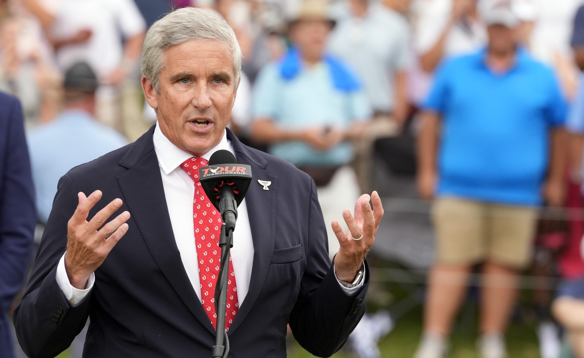 Sep 1, 2024; Atlanta, Georgia, USA; PGA TOUR Commissioner Jay Monahan addresses the gallery gathered on the 18th green after the final round of the TOUR Championship golf tournament.